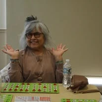 Avina of Milwaukee Senior Living assisted living and independent living in Milwaukee, WI, resident having fun playing Bingo