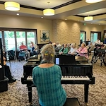 The Village at Keizer Ridge Assisted Living and Memory Care residents enjoy listening to music