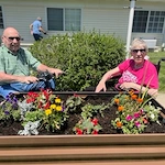 Pathfinder Senior Living in Fremont, NE, residents enjoying the nice weather outdoors