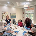 Bartlett Reserve independent living in Durham, NC, residents making treats together during a community activity