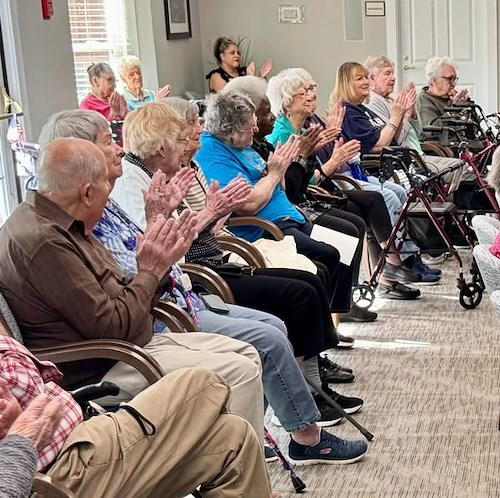 The Forum at The Crossing residents enjoy entertainment
