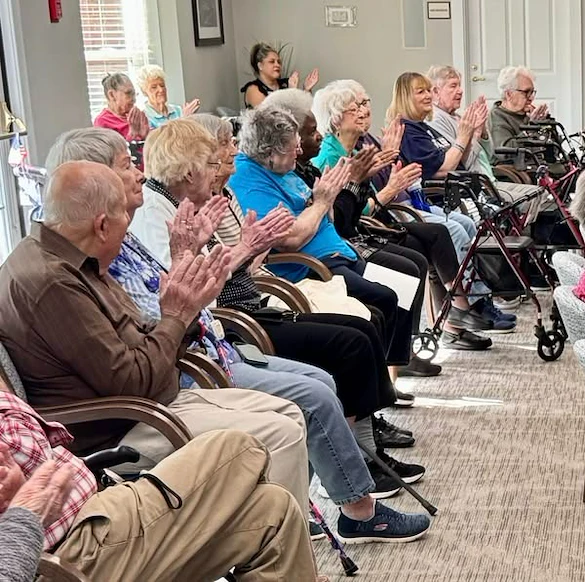 The Forum at The Crossing residents enjoy entertainment