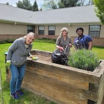 Charter Senior Living of Columbia residents gardening