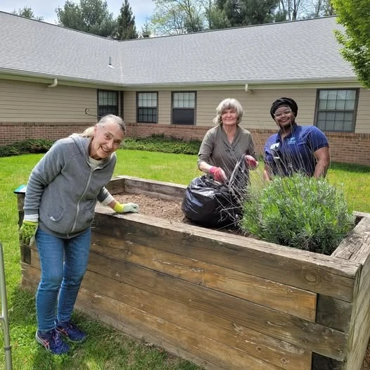 Charter Senior Living of Columbia residents gardening
