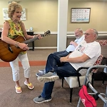 Pathfinder Senior Living in Fremont, NE, residents enjoying music