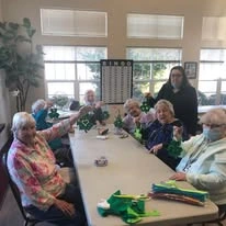 Heatherwood Gracious Retirement Living Hawthorn Senior Independent Living in Tewksbury, Massachusetts residents crafting for St. Patrick's Day
