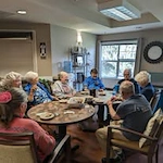 Avamere at Seaside senior living community offering independent living, assisted living, memory care, and respite care in Seaside, OR, residents socializing