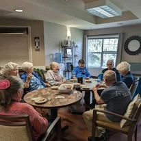 Avamere at Seaside senior living community offering independent living, assisted living, memory care, and respite care in Seaside, OR, residents socializing