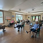 Noel Manor Retirement Living Verona, WI, residents staying active with a fitness class