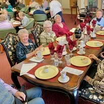 Salmon Creek Gracious Retirement Living Hawthorn Senior Independent Living in Boise, Idaho resident eating at a dining table