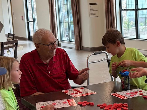 CopperWood at Prairie Trail resident enjoys visitors and a fun activity