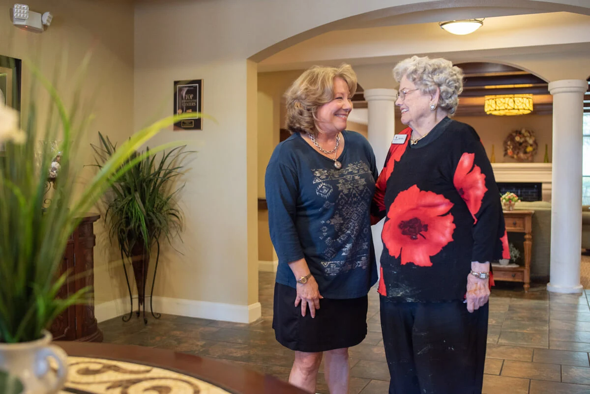 Franklin Park at Sonterra residents chatting and smiling