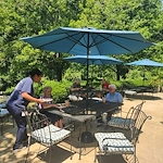 Charter Senior Living of Fredericksburg, Virginia, residents socializing outside in a comfortable environment