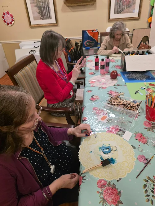 Charter Senior Living of Gainesville, Florida, residents doing arts and crafts