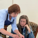 Suzanne Elise Assisted Senior Living in Seaside, Oregon resident being helped by a staff member