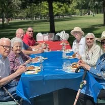 Camden Springs Gracious Retirement Living Hawthorn Senior Independent Living in Elk Grove, California residents outside for a picnic