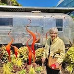 Fieldstone Memory Care of Bainbridge resident smiles as she enjoys a trip to see amazing art