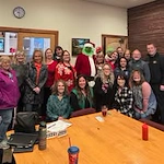 Avamere at Sandy senior living community offering assisted living, memory care, and respite care in Sandy, OR, residents at a Christmas party