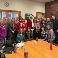 Avamere at Sandy senior living community offering assisted living, memory care, and respite care in Sandy, OR, residents at a Christmas party