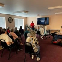 Stoneybrook Lodge Gracious Retirement Living Hawthorn Senior Independent Living in Corvallis, Oregon residents watching a movie