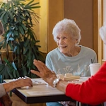 Vineyard Park of Sumner Independent and Assisted Living residents enjoying playing a game together and socializing