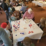 Gilman Grove Assisted Senior Living in Oregon City, Oregon resident playing a game with kids