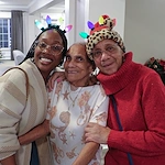 American House Dearborn Heights, senior living community offering independent living and respite care in Dearborn Heights, MI, resident and family smiling
