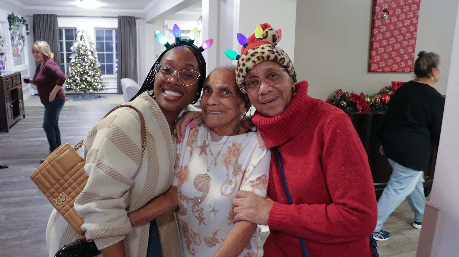 American House Dearborn Heights, senior living community offering independent living and respite care in Dearborn Heights, MI, resident and family smiling