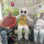 Avamere at Englewood Heights senior living community offering assisted living, memory care, and respite care in Yakima, WA, residents taking a picture with the Easter bunny