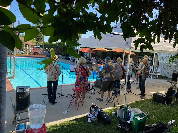 Covenant Living at the Samarkand in Santa Barbara, CA, residents enjoying music outdoors