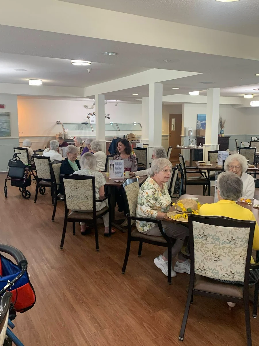 Mercy Village residents socializing and celebrating Mother's Day