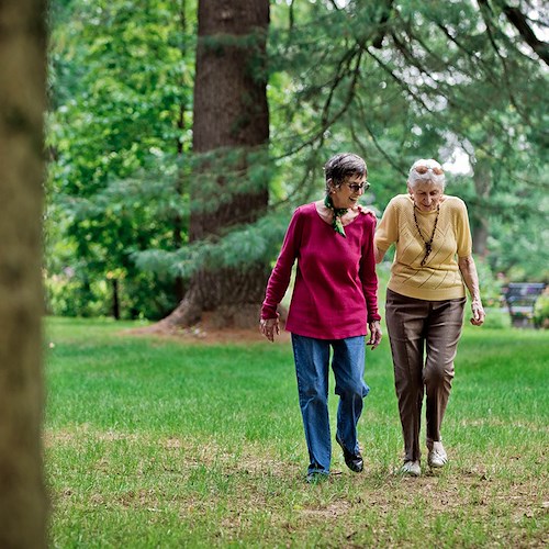 The Mansion at Rosemont Senior Living in Rosemont, PA, residents walking together and visiting