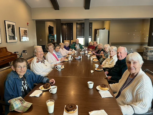 Park Vista Retirement Living - Camanche, IA, residents enjoy socializing