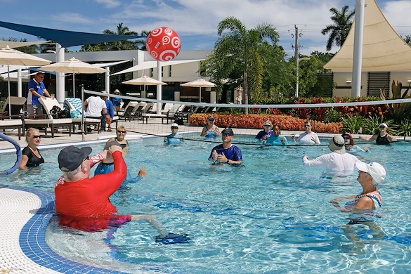 John Knox Village Of Florida, Inc. CCRC senior living in Pompano Beach, FL residents playing pool volleyball