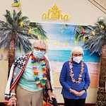 residents dressed up for beach party at Magnolia Heights Gracious Retirement Living Hawthorn Senior Independent Living in Franklin, Massachusetts