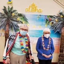 residents dressed up for beach party at Magnolia Heights Gracious Retirement Living Hawthorn Senior Independent Living in Franklin, Massachusetts