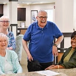 Ashton Gardens Gracious Retirement Living Hawthorn Senior Living Community in Portland, Maine residents laughing