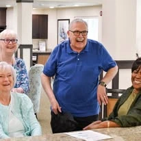 Ashton Gardens Gracious Retirement Living Hawthorn Senior Living Community in Portland, Maine residents laughing