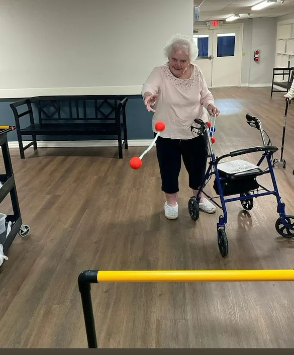 Charter Senior Living of Chattanooga resident enjoys playing games inside
