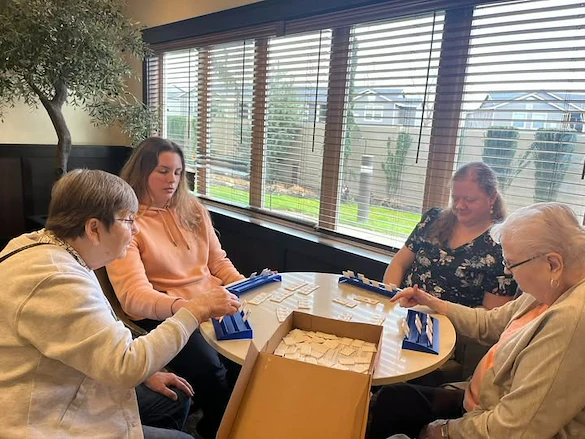 The Village at Keizer Ridge Assisted Living and Memory Care residents enjoy playing games