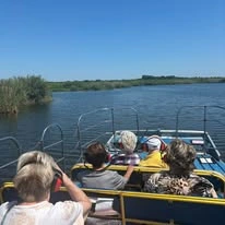 The Savoy Gracious Retirement Living Hawthorn Senior Independent Living in Winter Springs, Florida residents on a boat